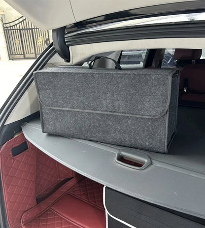 Felt car boot organiser on the cargo cover of an open car boot