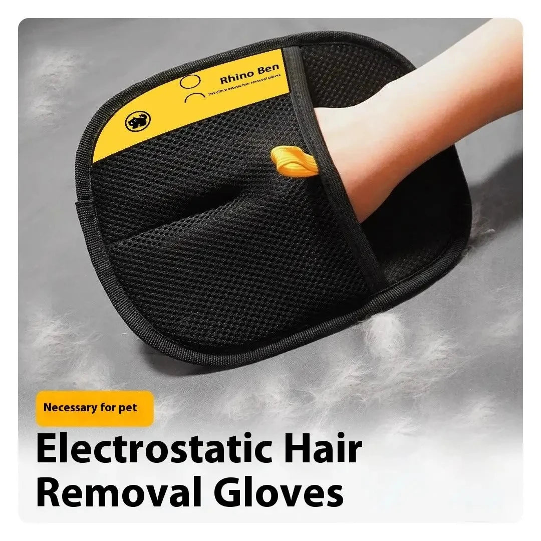 Black pet hair removal mitt worn on a hand