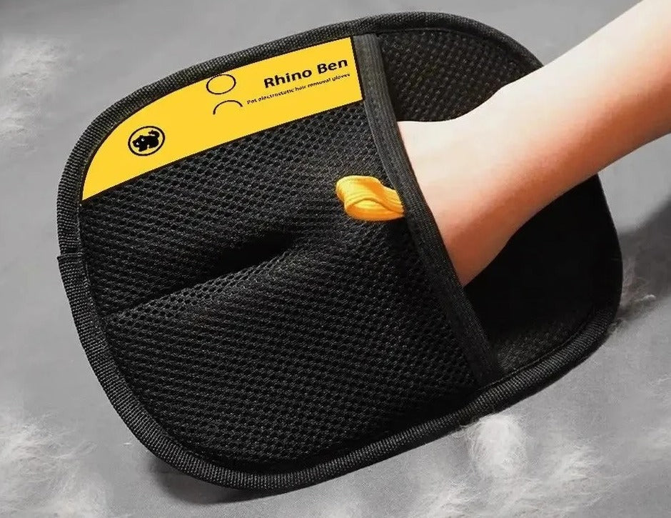 Black pet hair removal mitt (style 2) in use