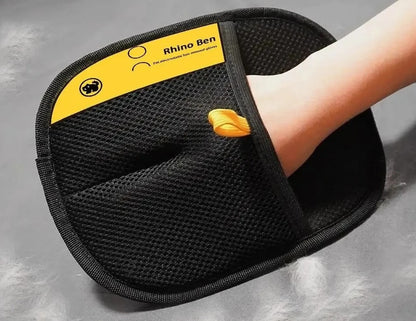 Black pet hair removal mitt (style 2) in use