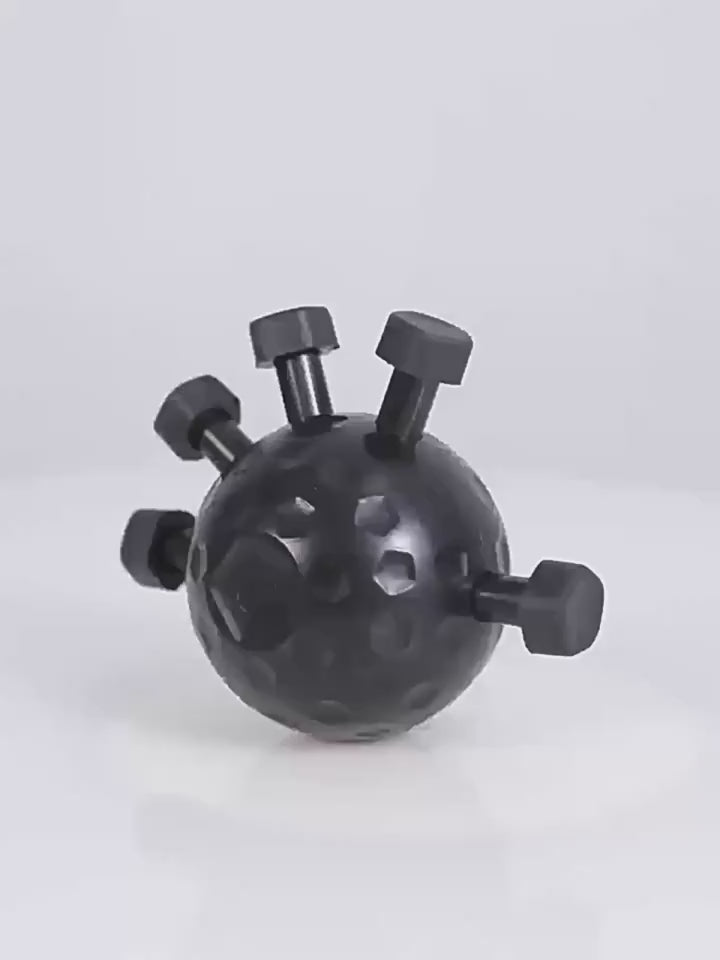 A hand squeezing the finger strength trainer ball