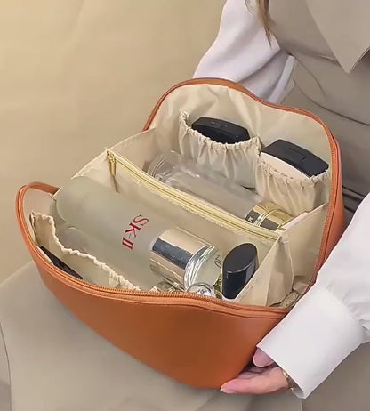 Packing toiletries into the soft toiletry bag