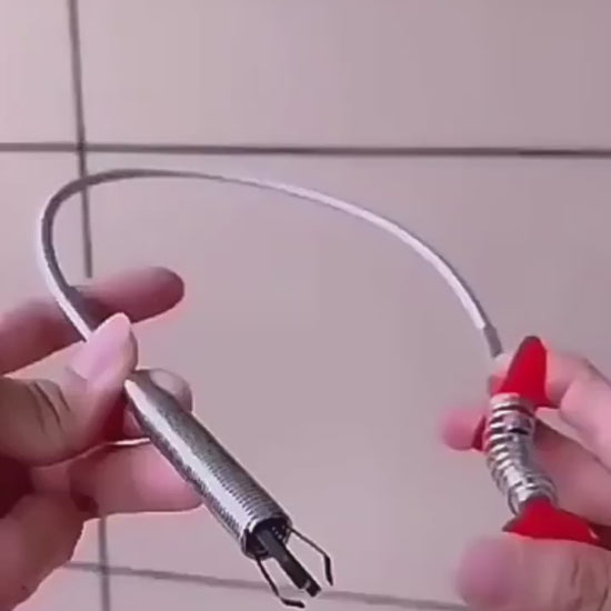 Clearing hair from a drain with the catcher tool