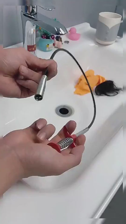 Clearing hair from a drain with the catcher tool