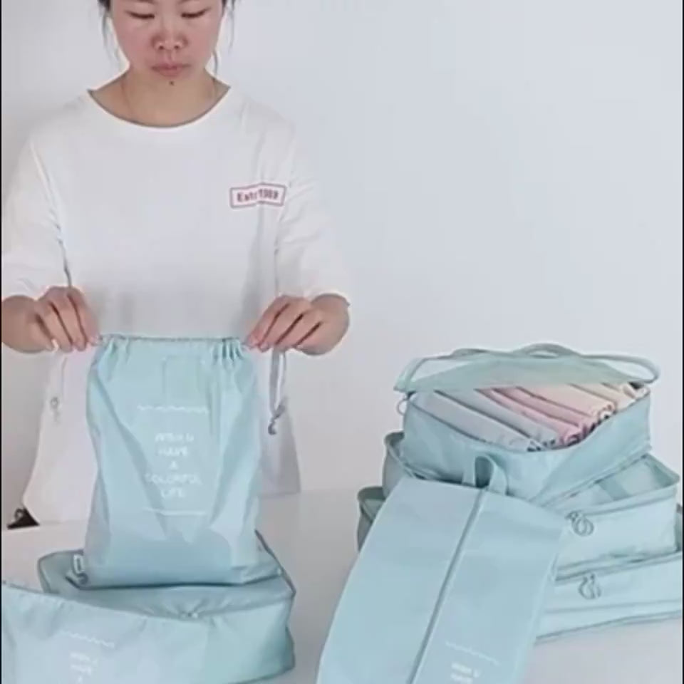 Packing clothes into the packing cubes